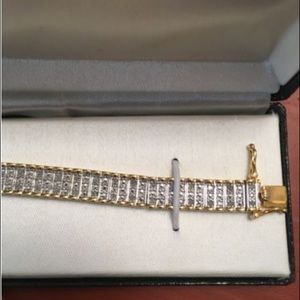 1 CTW Gold over brass bracelet. NEVER WORN.